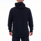 Black hoodie with white text on sleeves worn by a person on a white background