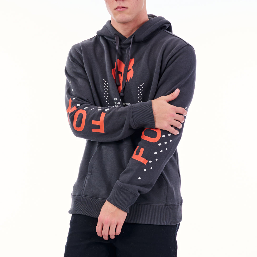 Person wearing a dark gray hoodie with orange text on sleeves against a white background