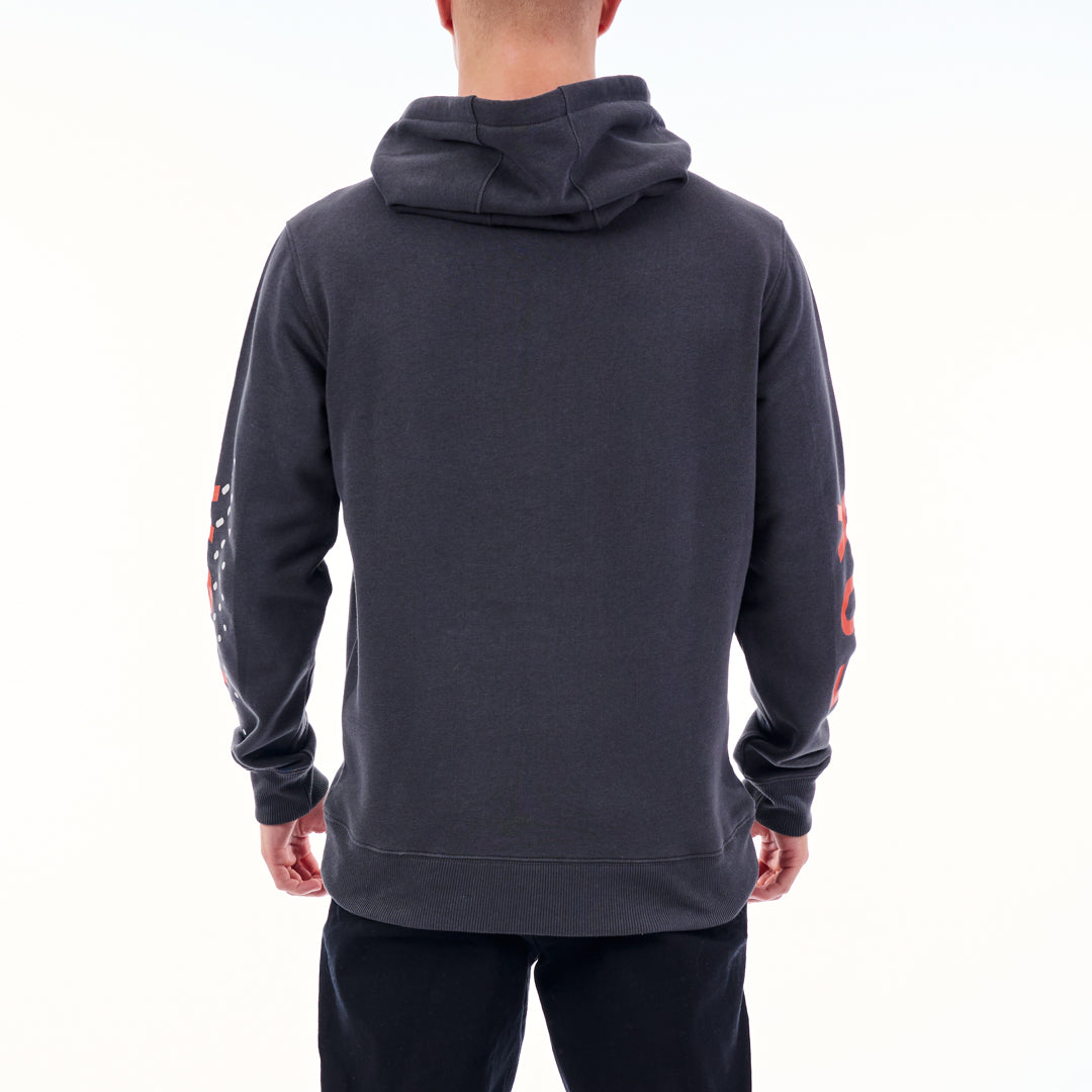 Person wearing a dark gray hoodie with colorful designs on the sleeves against a white background