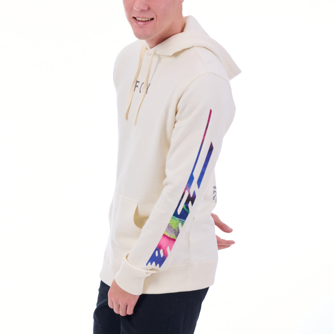 Person wearing a cream hoodie with colorful designs on sleeves against a white background